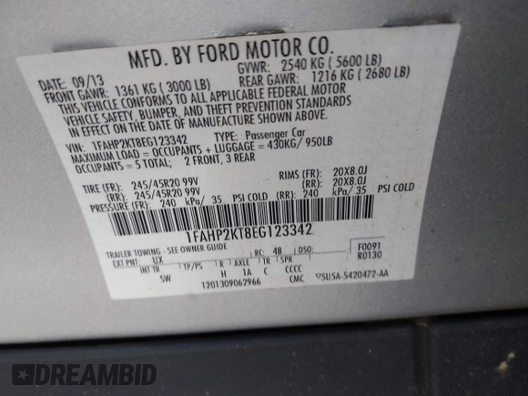 2014 Ford Taurus SHO with VIN 1FAHP2KT8EG123342, listed as a IAAI auction lot 42095390 with 142,957 mi miles. Bid and sale history available at carsss.com. Image 9.