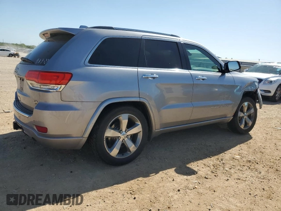 2014 Jeep Grand Cherokee Overland with VIN 1C4RJFCG7EC153156, listed as a Copart auction lot 52452925 with 152,348 mi miles and Salvage Title. Bid and sale history available at DreamBid. Image 3.