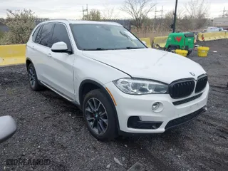 2018 BMW X5 xDrive35i with VIN 5UXKR0C58J0Y05234, listed as a IAAI auction lot 41957904 with 125,658 mi miles. Bid and sale history available at carsss.com. Image 1.