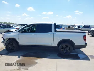 2023 Honda Ridgeline Black Edition with VIN 5FPYK3F8XPB009920, listed as a IAAI auction lot 42086798 with 37,192 mi miles and . Bid and sale history available at DreamBid. Image 14.
