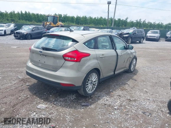 2015 Ford Focus Titanium с VIN 1FADP3N2XFL367753, выставлен на аукционе IAAI как лот 42695722 с пробегом 26 565 миль миль и . История ставок и продаж доступна на DreamBid. Изображение 4.