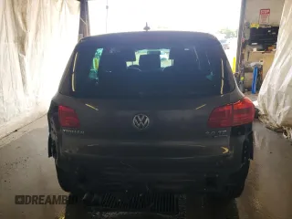2014 Volkswagen Tiguan SEL with VIN WVGBV3AX2EW541476, listed as a Copart auction lot 64817795 with 158,032 mi miles and Salvage title. Bid and sale history available at DreamBid. Image 6.