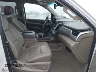 2018 Chevrolet Tahoe LT with VIN 1GNSCBKC7JR101043, listed as a IAAI auction lot 42192481 with 152,831 mi miles and . Bid and sale history available at DreamBid. Image 5.