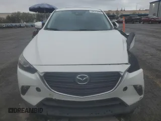 2019 Mazda CX-3 Touring with VIN JM1DKFC77K0450190, listed as a Copart auction lot 49171075 with 57,115 mi miles and Salvage Title. Bid and sale history available at carsss.com. Image 5.
