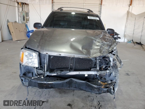 2004 GMC Envoy SLT with VIN 1GKET16S146222288, listed as a Copart auction lot 49316405 with 210,424 mi miles and Salvage Title. Bid and sale history available at DreamBid. Image 5.