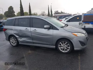 2012 Mazda 5 Touring с VIN JM1CW2CLXC0126576, выставлен на аукционе IAAI как лот 41759917 с пробегом 144 596 миль миль и . История ставок и продаж доступна на DreamBid. Изображение 13.