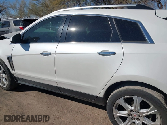 2013 Cadillac SRX Performance Collection with VIN 3GYFNDE37DS599557, listed as a IAAI auction lot 41633569 with 100,611 mi miles and . Bid and sale history available at DreamBid. Image 14.