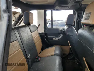 2012 Jeep Wrangler Unlimited Rubicon с VIN 1C4HJWFG4CL103531, выставлен на аукционе Copart как лот 48131665 с пробегом 183 234 миль миль и Списание • Salvage title. История ставок и продаж доступна на DreamBid. Изображение 10.