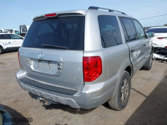 2004 Honda Pilot EX with VIN 2HKYF18514H503083, listed as a IAAI auction lot 41796369 with 172,187 mi miles. Bid and sale history available at carsss.com. Image 4.