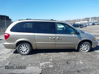 2002 Chrysler Town & Country EX with VIN 2C8GP74LX2R573857, listed as a IAAI auction lot 41846302 with Not Provided miles and . Bid and sale history available at carsss.com. Image 12.