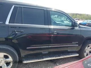 2018 Chevrolet Tahoe LT with VIN 1GNSKBKC7JR245565, listed as a IAAI auction lot 42097400 with 123,709 mi miles and . Bid and sale history available at DreamBid. Image 14.