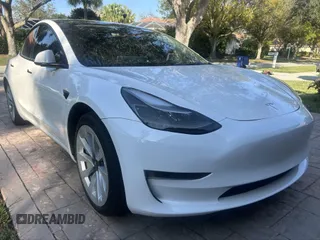 2023 Tesla Model 3 with VIN 5YJ3E1EA4PF555051, listed as a IAAI auction lot 41500331 with 11,810 mi miles. Bid and sale history available at carsss.com. Image 1.