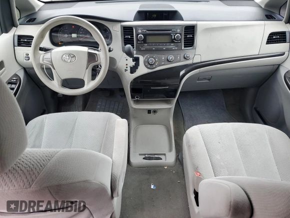 2012 Toyota Sienna with VIN 5TDKA3DC4CS014867, listed as a Copart auction lot 43191655 with 169,517 mi miles and Salvage Title. Bid and sale history available at DreamBid. Image 8.