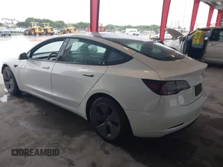 2023 Tesla Model 3 with VIN 5YJ3E1EA9PF548726, listed as a IAAI auction lot 42345157 with 30,647 mi miles and . Bid and sale history available at DreamBid. Image 3.