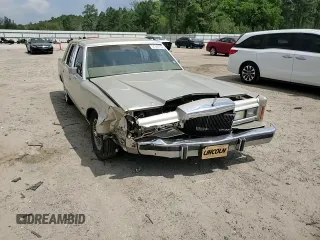 1989 Lincoln Town Car z VIN 1LNBM81F8KY816906, wystawiony jako Copart lot #51316715 z przebiegiem 361 830 mil mil oraz Szkoda całkowita • Salvage title. Historia ofert i sprzedaży dostępna na DreamBid. Obrazek 11.