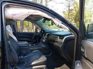 2015 Chevrolet Suburban LT with VIN 1GNSCJKC1FR264255, listed as a IAAI auction lot 42065176 with 115,861 mi miles. Bid and sale history available at carsss.com. Image 5.