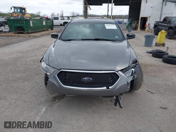 2014 Ford Taurus SHO with VIN 1FAHP2KTXEG160800, listed as a IAAI auction lot 42083237 with 75,048 mi miles. Bid and sale history available at carsss.com. Image 13.