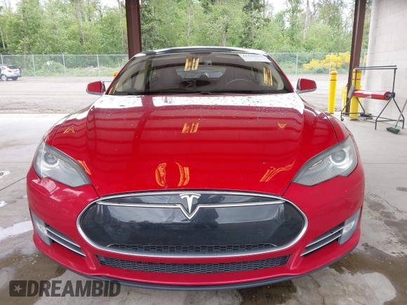 2013 Tesla Model S with VIN 5YJSA1CN7DFP26996, listed as a IAAI auction lot 42244540 with 128,160 mi miles and . Bid and sale history available at DreamBid. Image 12.