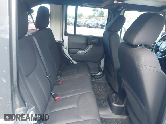 2014 Jeep Wrangler Unlimited Sport with VIN 1C4BJWDG6EL194359, listed as a IAAI auction lot 42182236 with 134,889 mi miles and . Bid and sale history available at DreamBid. Image 8.