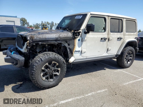 2024 Jeep Wrangler Rubicon X с VIN 1C4RJXR62RW167216, выставлен на аукционе Copart как лот 49034325 с пробегом Не указан миль и Списание • Salvage title. История ставок и продаж доступна на DreamBid. Изображение 1.