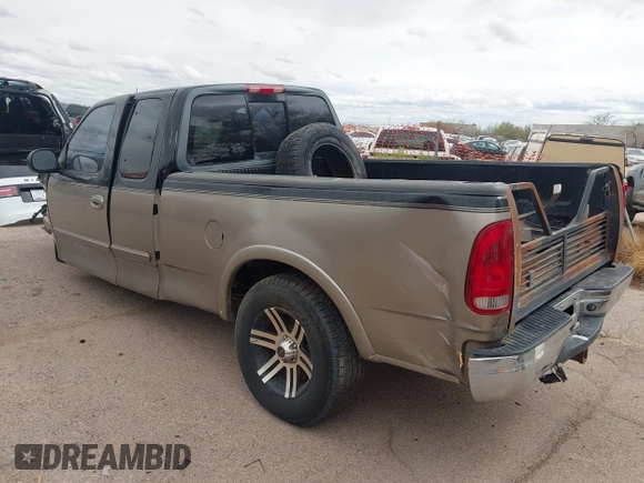 2003 Ford F-150 XL with VIN 1FTRX18LX3NB05434, listed as a IAAI auction lot 41799343 with 1 mi miles. Bid and sale history available at carsss.com. Image 3.