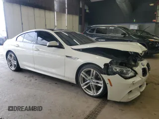 2015 BMW 6 Series 650i xDrive with VIN WBA6B4C54FD761440, listed as a Copart auction lot 45851515 with 64,060 mi miles and Salvage Title. Bid and sale history available at DreamBid. Image 4.
