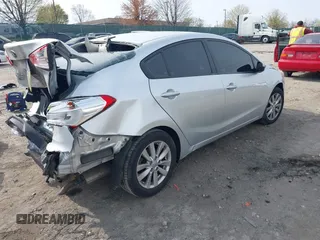 2014 Kia Forte LX with VIN KNAFX4A61E5081257, listed as a IAAI auction lot 42011042 with Not Provided miles and . Bid and sale history available at carsss.com. Image 4.