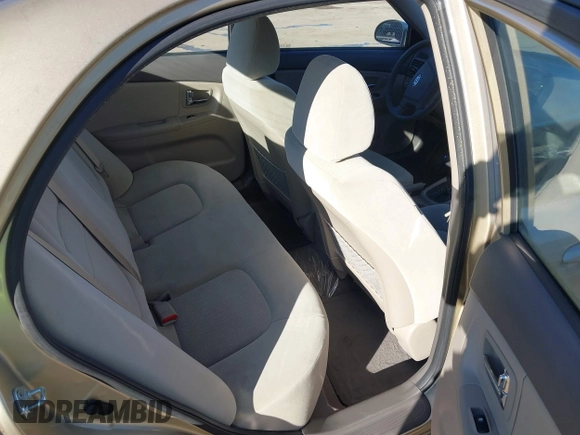 2009 Kia Spectra EX with VIN KNAFE222595666726, listed as a IAAI auction lot 40677796 with 25,305 mi miles. Bid and sale history available at carsss.com. Image 8.