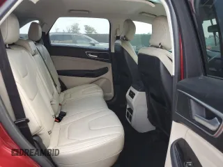 2015 Ford Edge Titanium z VIN 2FMTK3K87FBB30209, wystawiony jako Copart lot #57725425 z przebiegiem 85 562 mil mil oraz Szkoda całkowita • Salvage title. Historia ofert i sprzedaży dostępna na DreamBid. Obrazek 11.