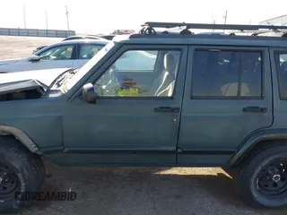 1997 Jeep Cherokee Country with VIN 1J4FT78S1VL522295, listed as a IAAI auction lot 42481630 with 340,239 mi miles and . Bid and sale history available at DreamBid. Image 15.