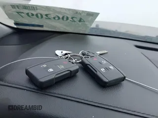 2020 Chevrolet Tahoe Commercial z VIN 1GNSKDEC9LR260983, wystawiony jako IAAI lot #42062097 z przebiegiem 124 911 mil mil oraz . Historia ofert i sprzedaży dostępna na DreamBid. Obrazek 11.