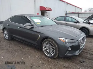 2021 Genesis G70 2.0T with VIN KMTG64LA3MU075557, listed as a IAAI auction lot 41484410 with 52,740 mi miles. Bid and sale history available at carsss.com. Image 1.