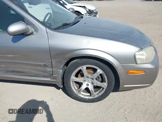 2003 Nissan Maxima GLE z VIN JN1DA31A83T411224, wystawiony jako IAAI lot #41905714 z przebiegiem Nie podano mil oraz . Historia ofert i sprzedaży dostępna na DreamBid. Obrazek 18.