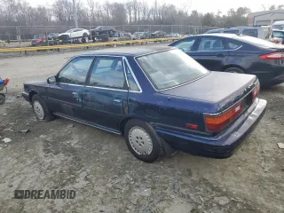 1989 Toyota Camry z VIN 4T1SV22E0KU032677, wystawiony jako Copart lot #46308555 z przebiegiem 993 896 mil mil oraz Czysty tytuł • Clean title. Historia ofert i sprzedaży dostępna na DreamBid. Obrazek 2.