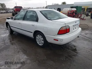 1996 Honda Accord LX with VIN 1HGCD5633TA266516, listed as a IAAI auction lot 41839684 with 162,523 mi miles and . Bid and sale history available at carsss.com. Image 3.
