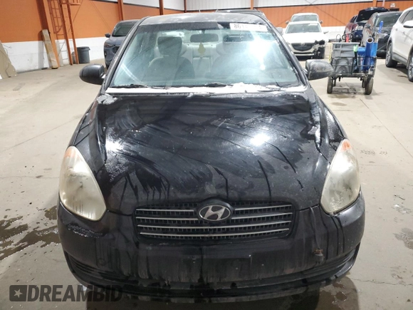 2007 Hyundai Accent GL z VIN KMHCN45C87U142295, wystawiony jako Copart lot #86149894 z przebiegiem 325 738 mil mil oraz Szkoda całkowita • Salvage title. Historia ofert i sprzedaży dostępna na DreamBid. Obrazek 5.