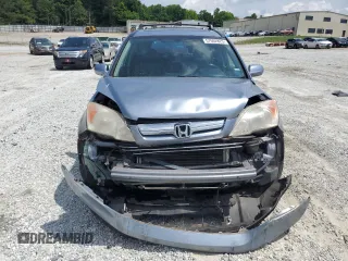 2007 Honda CR-V EX-L z VIN JHLRE38797C082267, wystawiony jako Copart lot #57602825 z przebiegiem 160 217 mil mil oraz Szkoda całkowita • Salvage title. Historia ofert i sprzedaży dostępna na DreamBid. Obrazek 5.