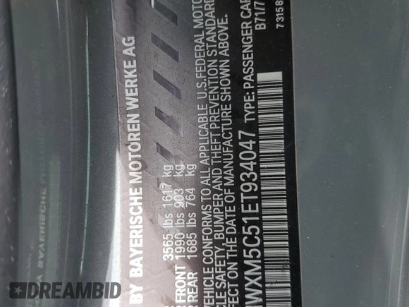 2014 MINI Hardtop with VIN WMWXM5C51ET934047, listed as a Copart auction lot 63039335 with 104,446 mi miles and Salvage title. Bid and sale history available at DreamBid. Image 14.
