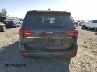 2021 Kia Sedona EX with VIN KNDMB5C11M6673086, listed as a Copart auction lot 42244935 with 57,698 mi miles and Salvage Title. Bid and sale history available at carsss.com. Image 6.