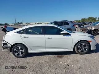 2020 Honda Civic LX z VIN 19XFC2F68LE206395, wystawiony jako IAAI lot #41720356 z przebiegiem 38 037 mil mil oraz . Historia ofert i sprzedaży dostępna na DreamBid. Obrazek 14.