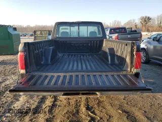 1990 Ford F-150 "S" with VIN 1FTDF15YXLNB40987, listed as a Copart auction lot 43691595 with 33,397 mi miles and Salvage Title. Bid and sale history available at carsss.com. Image 6.