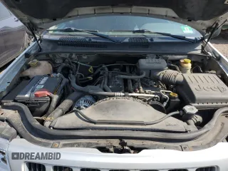 2004 Jeep Grand Cherokee Laredo with VIN 1J4GW48S44C282992, listed as a Copart auction lot 61523685 with 112,486 mi miles and Clean title. Bid and sale history available at DreamBid. Image 12.