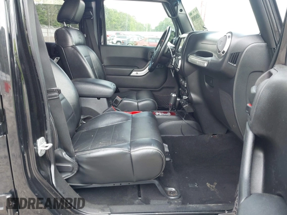 2012 Jeep Wrangler Unlimited Sahara with VIN 1C4HJWEG0CL168300, listed as a IAAI auction lot 42430678 with 70,000 mi miles and . Bid and sale history available at DreamBid. Image 5.