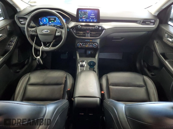 2021 Ford Escape Titanium Plug-In Hybrid z VIN 1FMCU0LZ8MUA66995, wystawiony jako Copart lot #60986765 z przebiegiem 69 609 mil mil oraz Czysty tytuł • Clean title. Historia ofert i sprzedaży dostępna na DreamBid. Obrazek 8.