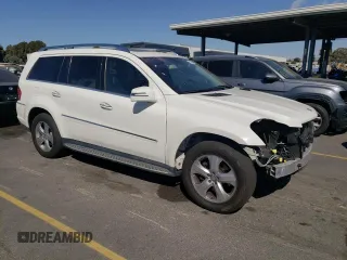 2012 Mercedes-Benz GL-Class GL 450 with VIN 4JGBF7BE3CA770454, listed as a Copart auction lot 74549424 with 69,662 mi miles and Salvage Title. Bid and sale history available at carsss.com. Image 4.
