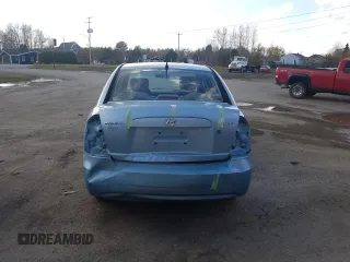 2007 Hyundai Accent GL z VIN KMHCN45C97U146808, wystawiony jako Copart lot #70781004 z przebiegiem Nie podano mil oraz Szkoda całkowita • Salvage title. Historia ofert i sprzedaży dostępna na DreamBid. Obrazek 6.