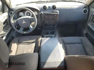 2007 Mitsubishi Raider LS z VIN 1Z7HC28K17S126320, wystawiony jako Copart lot #52749265 z przebiegiem 148 586 mil mil oraz Szkoda całkowita • Salvage title. Historia ofert i sprzedaży dostępna na DreamBid. Obrazek 8.