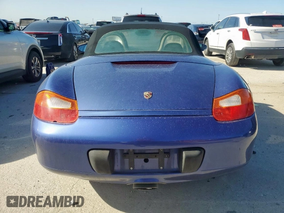 1999 Porsche Boxster z VIN WP0CA2980XU629582, wystawiony jako Copart lot #57534035 z przebiegiem 190 873 mil mil oraz Czysty tytuł • Clean title. Historia ofert i sprzedaży dostępna na DreamBid. Obrazek 6.