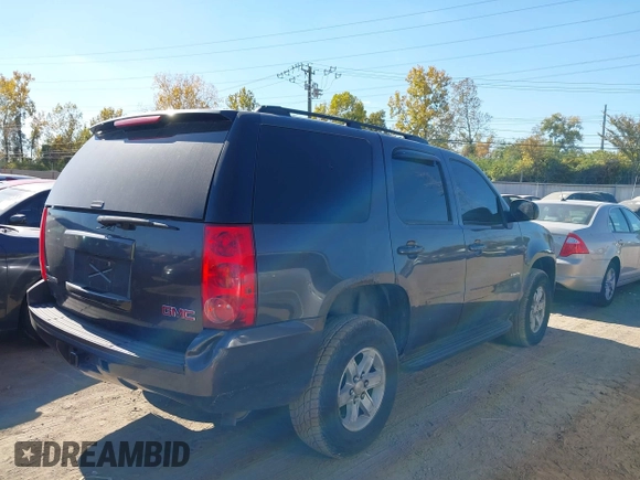 2011 GMC Yukon SLE with VIN 1GKS2AE04BR207818, listed as a IAAI auction lot 40669731 with 312,959 mi miles. Bid and sale history available at carsss.com. Image 4.