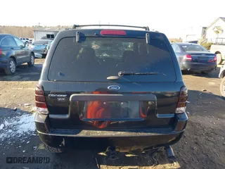 2002 Ford Escape Limited with VIN 1FMCU041X2KC74197, listed as a IAAI auction lot 41363369 with 153,704 mi miles. Bid and sale history available at carsss.com. Image 16.